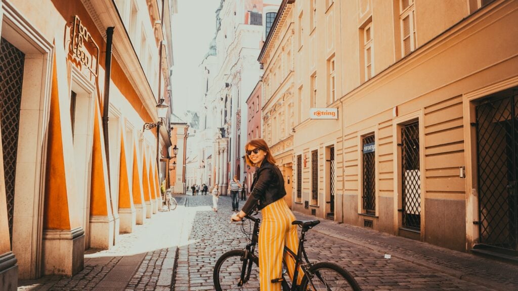 woman riding black hardtail bike